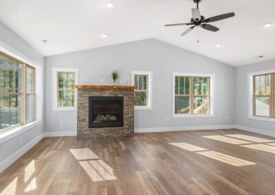 Great room with fireplace and wood floors