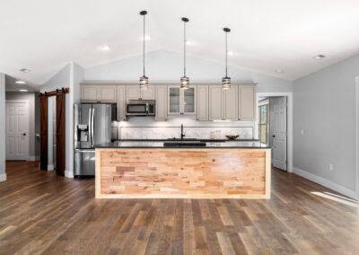 Kitchen with granite countertops and island